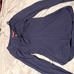A long sleeve navy body suit shirt
